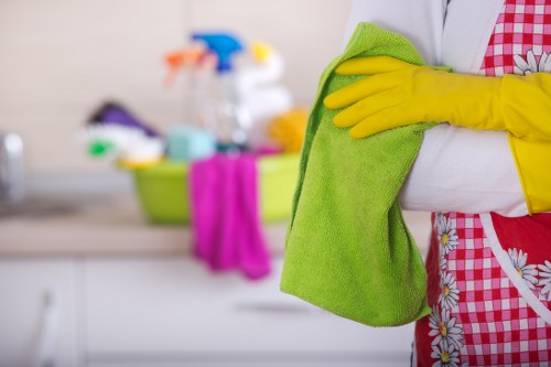 Technician confirming a carpet cleaning booking