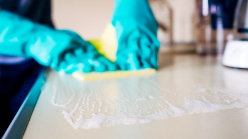 Deep mattress cleaning equipment used on a bed in a Rotherhithe home