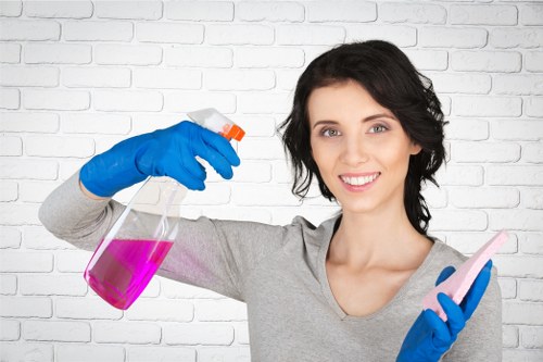 Professional carpet cleaner treating a stain in a Rotherhithe property
